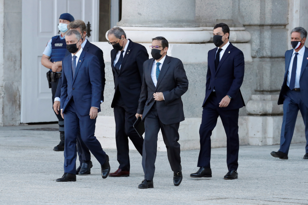 El lehendakari, Íñigo Urkullu, el president de la Generalitat, Quim Torra y el presidente de Andalucía, Juanma Moreno a su llegada al Patio de la Armería del Palacio Real
