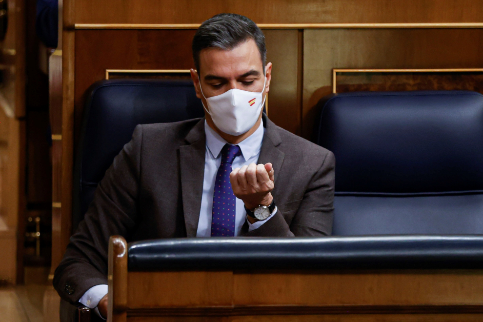 El presidente del Gobierno, Pedro Sánchez, asiste al pleno del Congreso de los Diputados que debate y vota este jueves la convalidación de la reforma laboral.