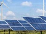 Imagen de placas solares y energía eólica