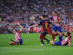 Messi, defendido por tres jugadores del Atlético