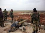 Syrian regime forces take aim Islamic State (IS) j