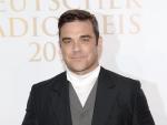 Robbie Williams es feliz en su papel de padre