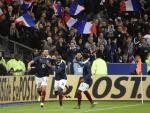 Gignac celebra con sus compañeros su gol a Alemania en el Stade de France / AFP