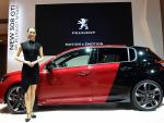 A model stands beside the new 308 GTi by Peugeot S
