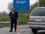 A police officer patrols at the France-Belgium bor