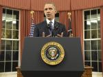 TOPSHOT - US President Barack Obama speaks during