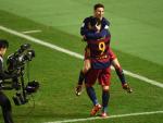 Barcelona forward Luis Suarez celebrates with Barc