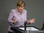 Merkel descarta dar lecciones sobre empleo a Macron y espera desarrollar iniciativas nuevas con él