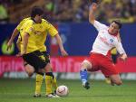 El líder Dortmund salva un punto en el último minuto ante el Hamburgo