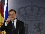 Spanish Prime Minister Mariano Rajoy gestures duri