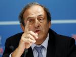 UEFA chief Michel Platini gestures as he speaks du