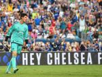 Chelsea goalkeeper Thibaut Courtois reacts after s