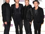 Robbie Williams podría permanecer con Take That tras su gira de verano