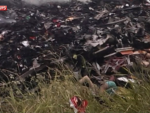 Dantescas imágenes del lugar en el que han caído los restos del vuelo de Malaysia Airlines en Donestk