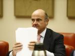 Guindos se reunirá en Washington con Moscovici, inversores y agencias de rating