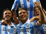 Los jugadores del Málaga celebran el segundo gol ante el Anderlecht