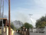 Vecinos de las parcelaciones advierten del "abandono total" de zonas de ribera del Guadalquivir ante incendios