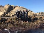 Cuatro nadadores de Sevilla logran cruzar el Estrecho para ayudar a niños de la India rural