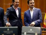 Pablo Iglesias y Alberto Garzón, en la recogida de sus carteras ministeriales