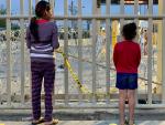 Dos menores en la frontera de México con Estados Unidos