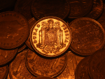 Fotografía de una moneda de peseta.