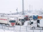 Camiones cubiertos de nieve en Burgos