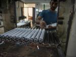 april_2023_meerut_uttar_pradesh_india_worker_makes_rubber_bat_grip_at_the