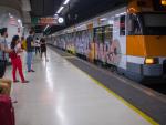 viajeros_esperan_llegada_tren_andenes_estacion_sants_septiembre_2022