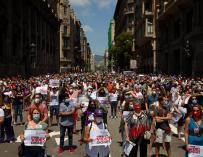 Momento de la manifestación convocada por los sindicatos CCOO, UGT, y USOC en la Vía Laietana de Barcelona