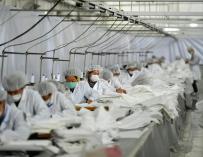 China trabajadores covid