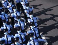 Agentes de Policía de China. FELIX WONG / ZUMA PRESS / CONTACTOPHOTO (Foto de ARCHIVO) 17/12/2020 ONLY FOR USE IN SPAIN