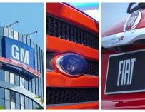 Logos de General Motors, Ford y Fiat (Stellantis).