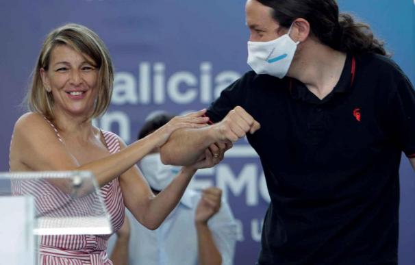 Pablo Iglesias, junto a la ministra de Trabajo y Economía Social, Yolanda Díaz