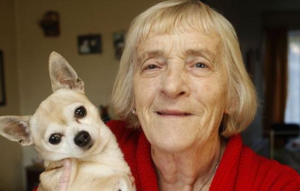 Margaret McKever with her dog Riso after being attacked by a bird