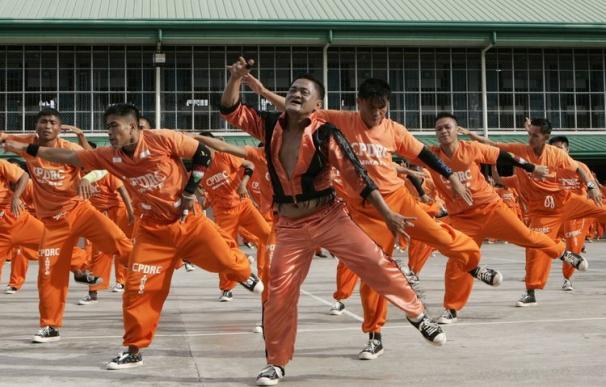 Prison inmates perform during a tribute to late pop icon Michael Jackson at prison grounds in Cebu