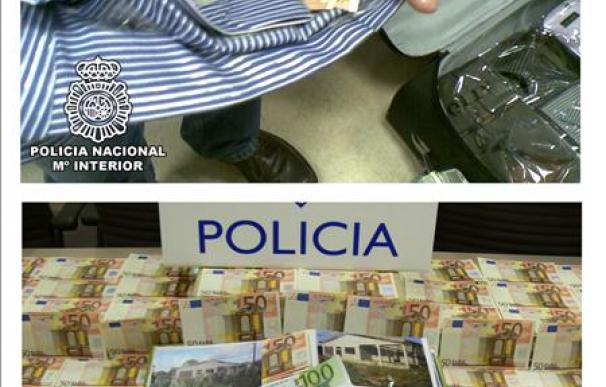 Intervenidos 90.000 euros falsos ocultos en camisas y en un álbum de fotos