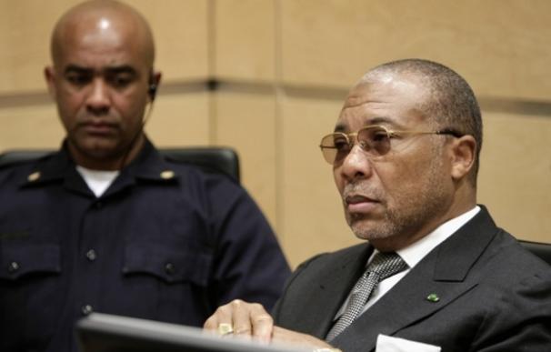 El ex dictador liberiano Charles Taylor durante su juicio por crímenes de guerra. Su hijo ha sido condenado a 97 años de cárcel por torturas | Reuters