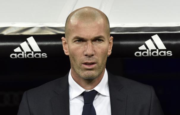 Real Madrid's new French coach Zinedine Zidane loo