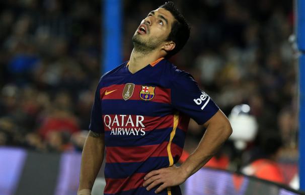 Barcelona's Uruguayan forward Luis Suarez reacts a