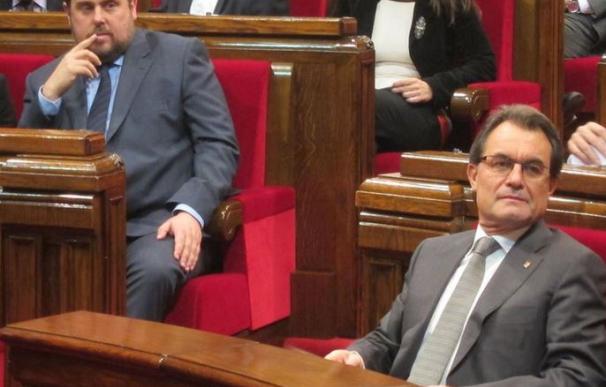 Oriol Junqueras y Artur Mas, en el Parlament (archivo).