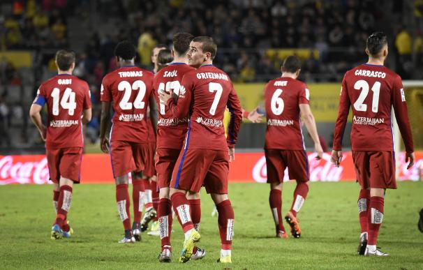 Griezmann anotó dos tantos en la victoria del Atlético. / AFP