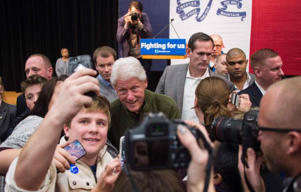 Former US President Bill Clinton takes selfies aft