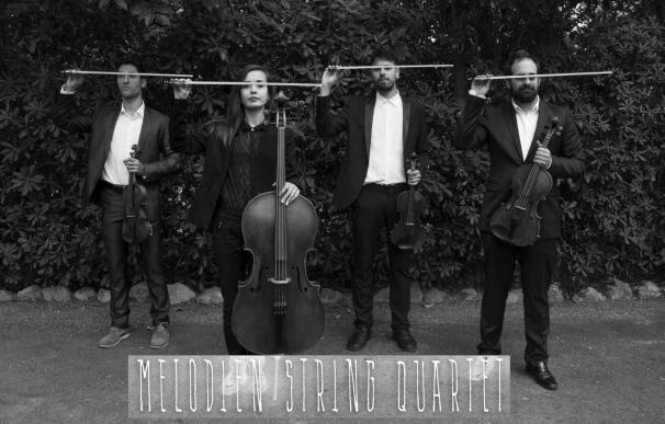 El grupo 'Melodien String Quartet' ofrece un concierto didáctico en la Residencia Universitaria Hernán Cortés (Badajoz)