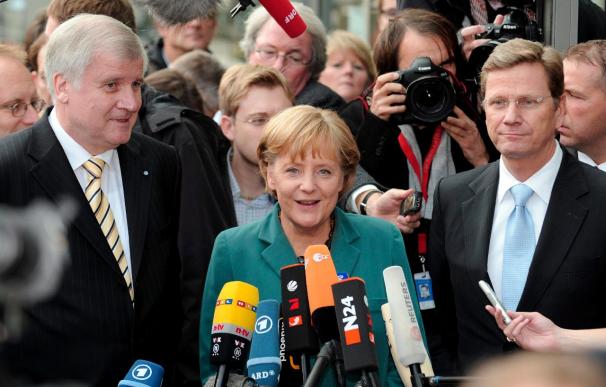 La Unión y los liberales negocian optimistas sobre el futuro Gobierno alemán pese a la crisis financiera
