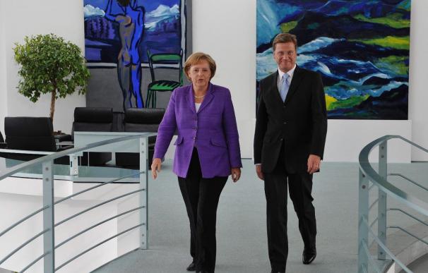 La Unión de Merkel y los liberales defienden su promesa de reducir los impuestos