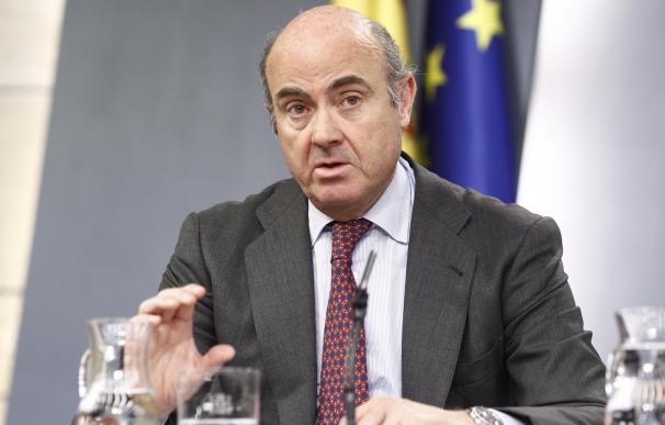 Guindos, "convencido" de que la unión de Bankia y BMN dará lugar a la entidad "más solvente" de España