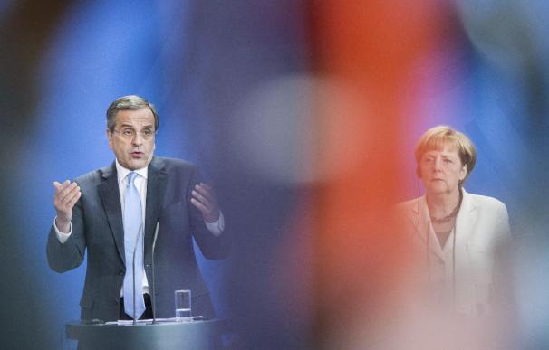 Merkel y Samarás ven "grandes progresos" en una Grecia que sale de la crisis