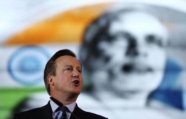 British Prime Minister David Cameron addresses a w