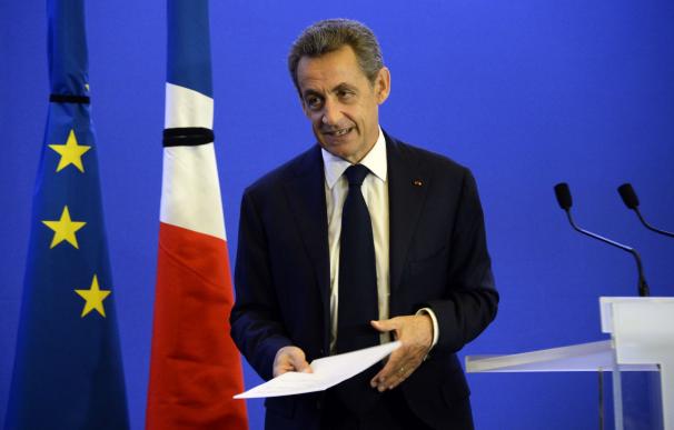 Former French President Nicolas Sarkozy deliver a