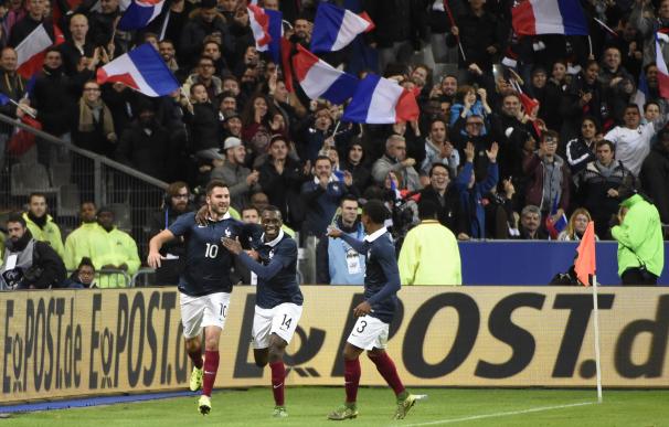 Gignac celebra con sus compañeros su gol a Alemania en el Stade de France / AFP